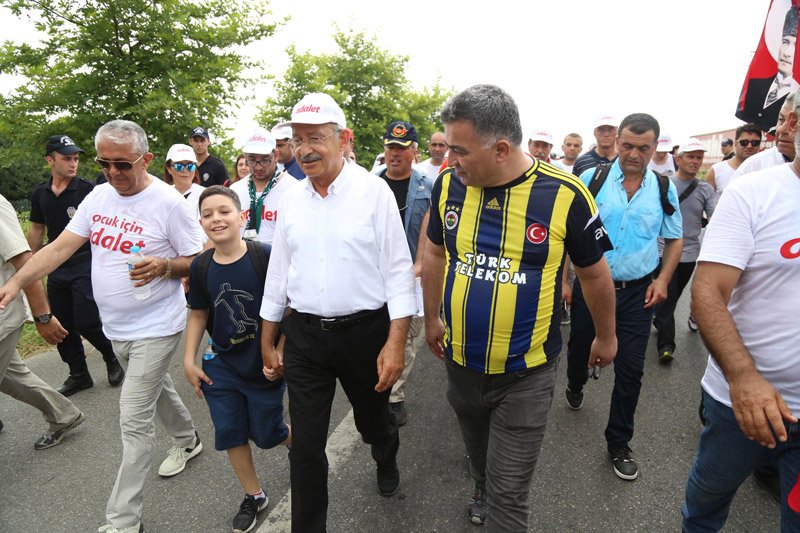 FOTO:DHA - Ülkü Ocakları eski Başkan Yardımcısı Mehmet Taşdelen de yürüyüşe katıldı.