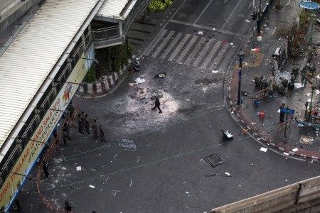 Experts investigate the site of a deadly blast in central Bangkok