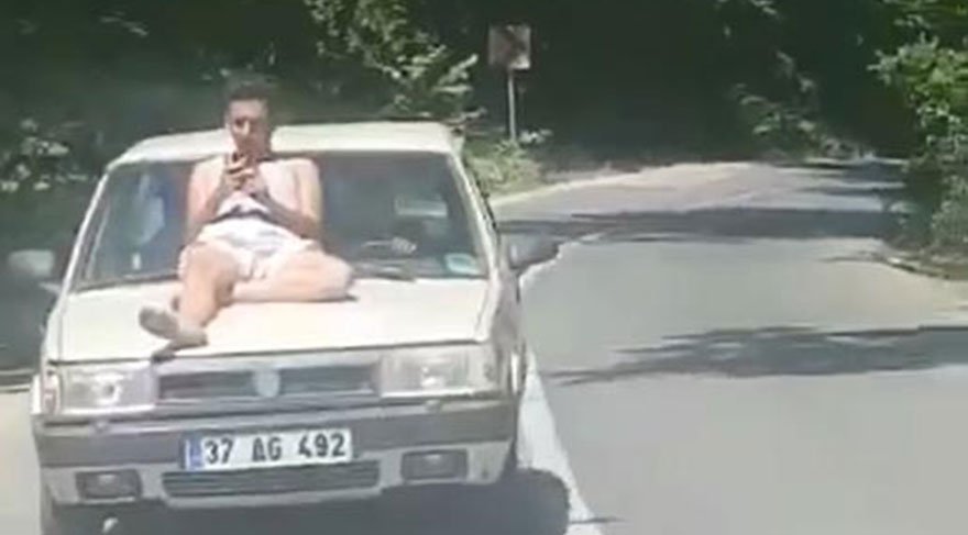 Otomobilin üzerine tehlikeli yolculuk