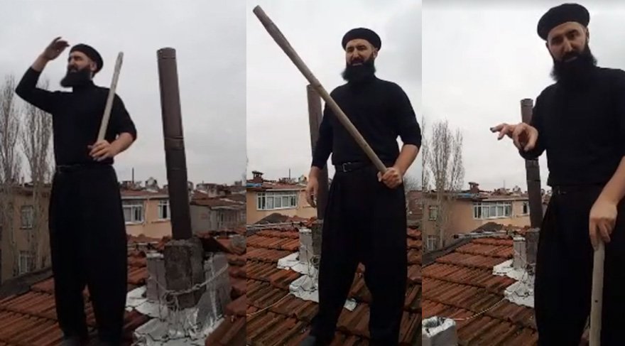Elinde sopayla, çatıda Noel Baba bekledi