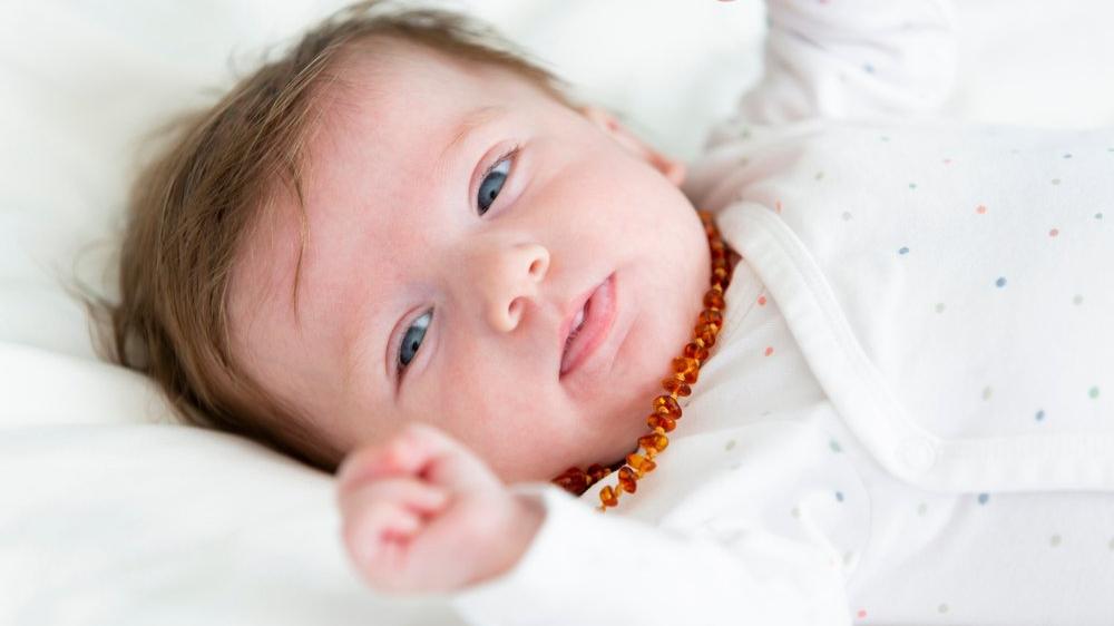 bebeklere neden kehribar kolye takilir