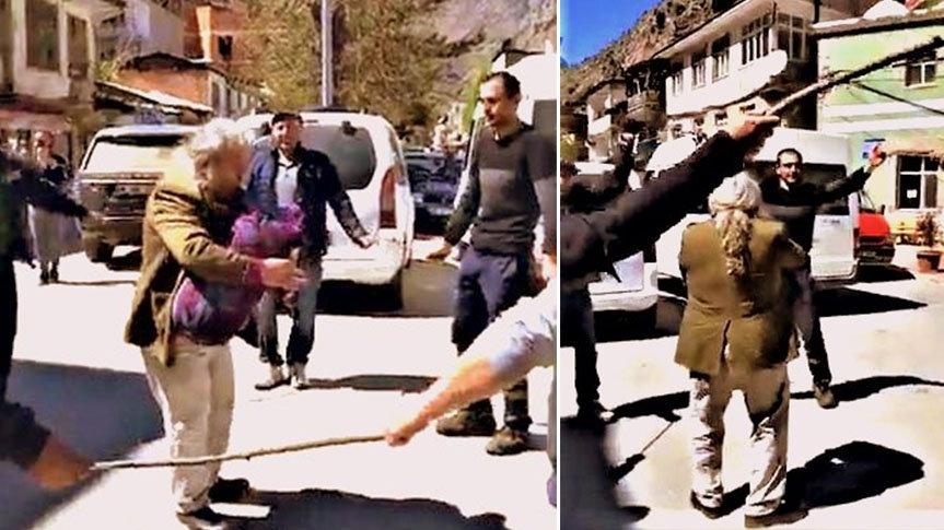 Maske takmadan sosyal mesafeyi çubukla sağlayarak horon teptiler
