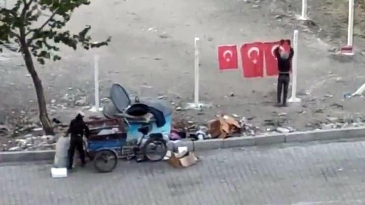 Two brothers claim the flags they found in the garbage at the August 30 ceremony