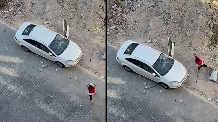 Öfkeli kadın hıncını arabadan çıkardı